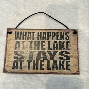 What Happens at the lake stays at the lake sign